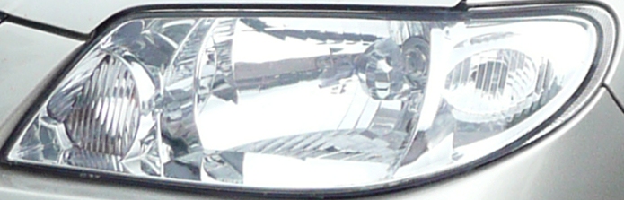 2003_Mazda_323_(BJ_II)_Astina_Shades_5-door_hatchback_01.jpg